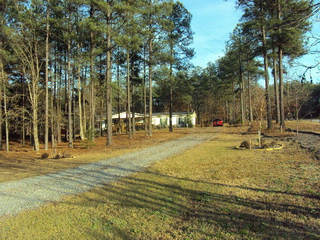 156 5th Road Haddock, GA 31033 - Photo 1 of 1 a view of a yard with basketball court