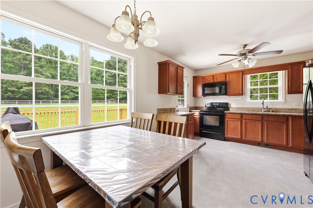 15490 Tyler Station Road Beaverdam, VA 23015 - Photo 15 of 45 Open-concept kitchen with wood-finish cabinetry, l