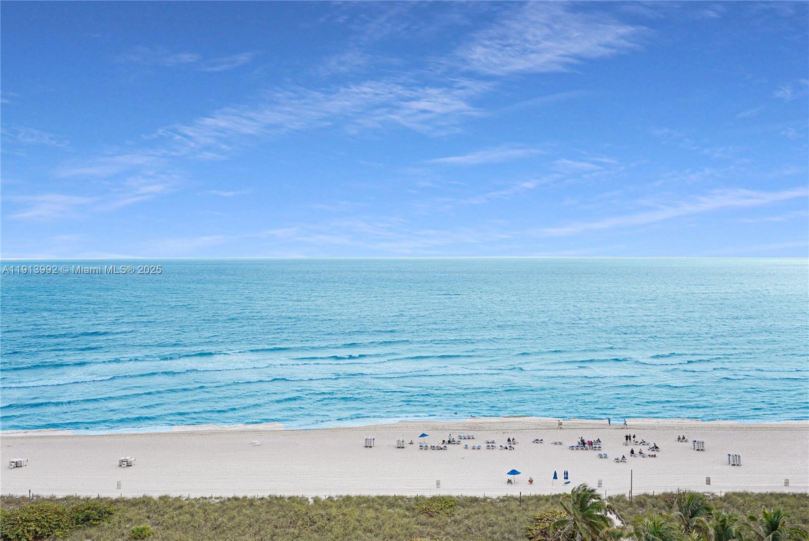 5101 Collins Avenue, Unit 14R Miami Beach, FL 33140 - Photo 8 of 9 a view of an ocean beach
