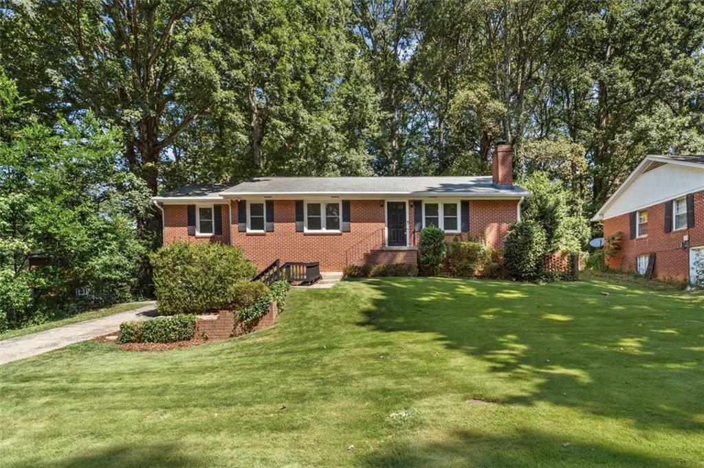 a house view with a garden space