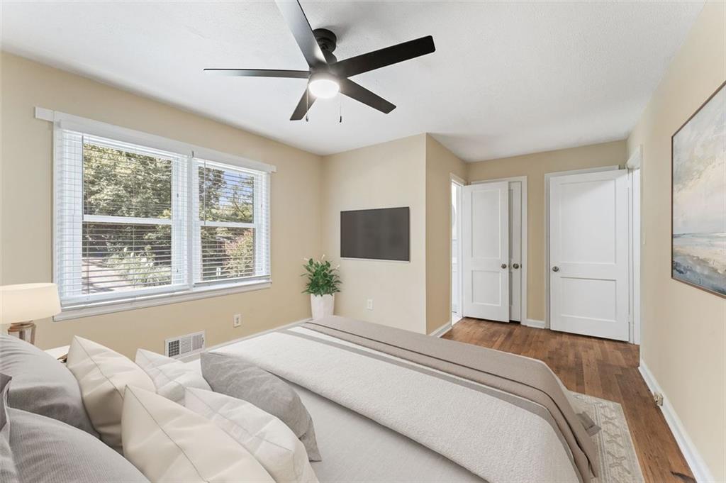 729 Timberland Street Smyrna, GA 30080 - Photo 15 of 26 a bedroom with a large bed and a window