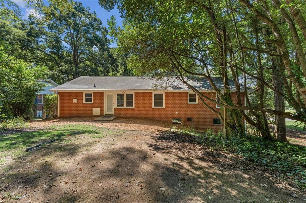 729 Timberland Street Smyrna, GA 30080 - Photo 22 of 26 a view of a house with a yard