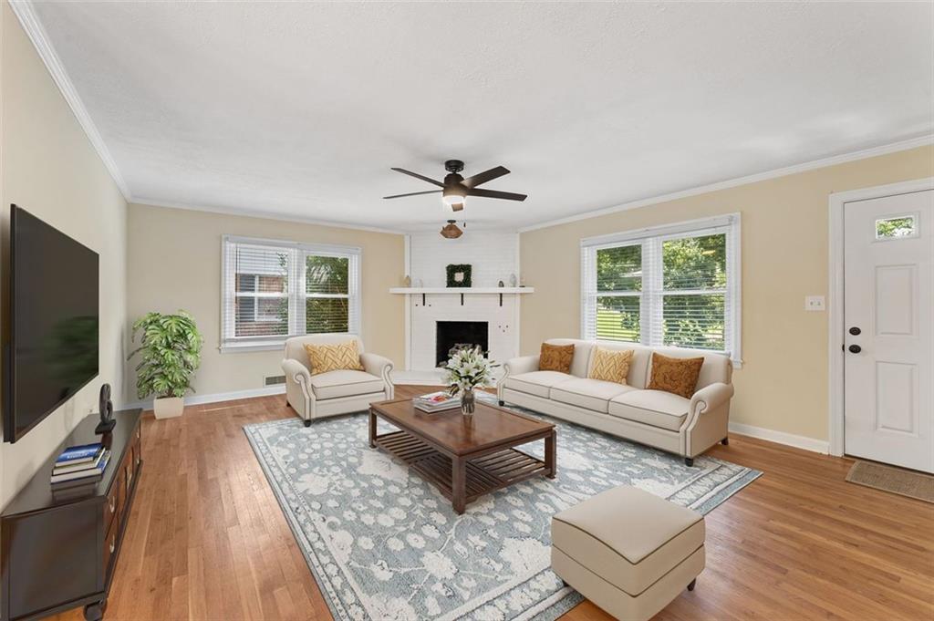 729 Timberland Street Smyrna, GA 30080 - Photo 5 of 26 a living room with furniture fireplace and window