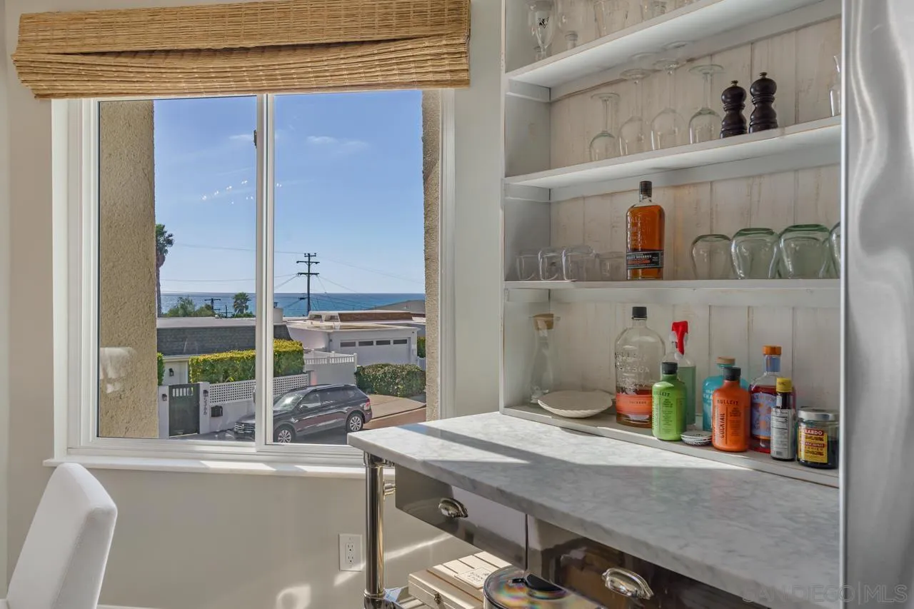5366 La Jolla Boulevard, Unit 101C La Jolla, CA 92037 - Photo 15 of 41 a view of a dining table with chairs