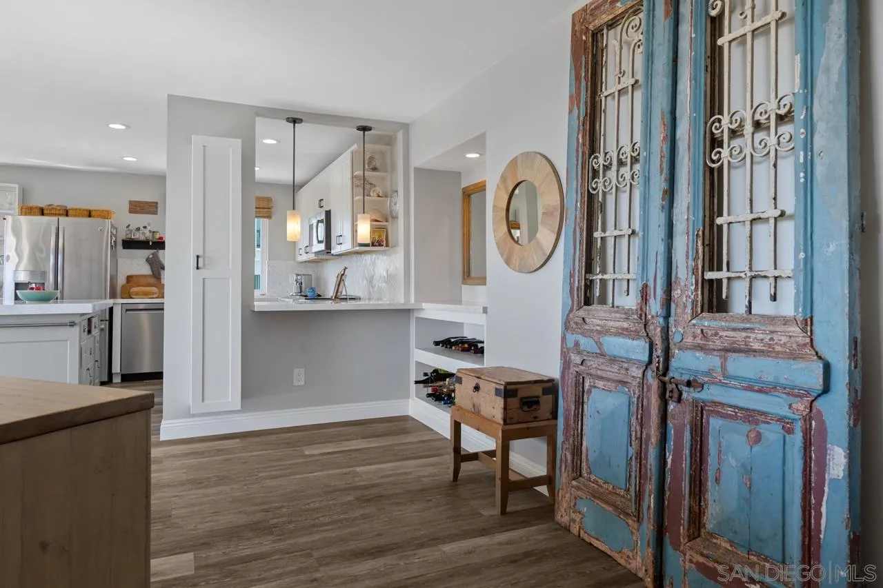 5366 La Jolla Boulevard, Unit 101C La Jolla, CA 92037 - Photo 17 of 41 a view of a kitchen cabinets and wooden floor