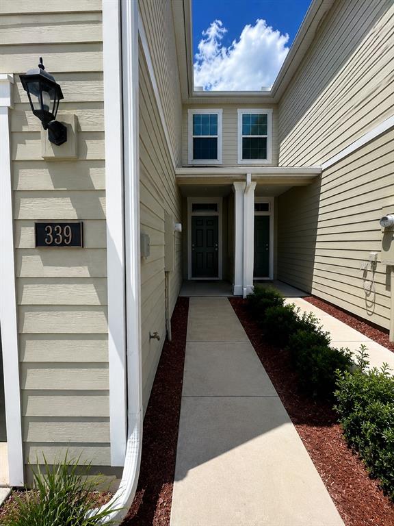 339 Redbud Road Palm Coast, FL 32137 - Photo 2 of 22 a view of a entryway front of house