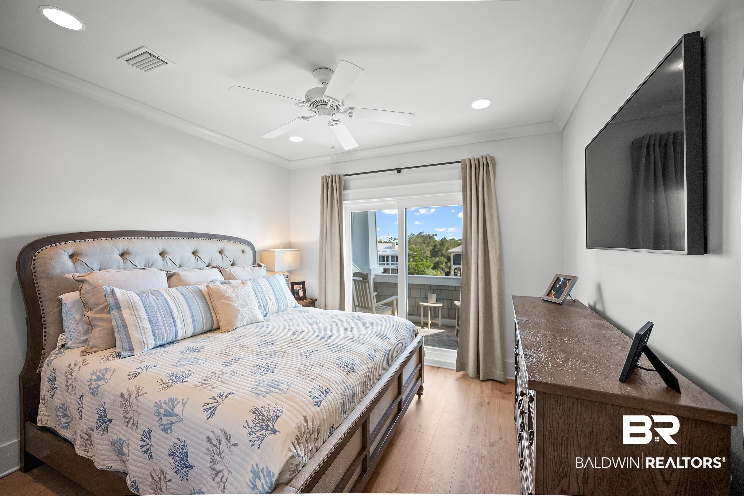 33186 Marlin Key Drive Orange Beach, AL 36561 - Photo 70 of 87 Bedroom featuring light wood-style flooring, ornamental molding, access to exterior, a ceiling fan, and recessed lighting