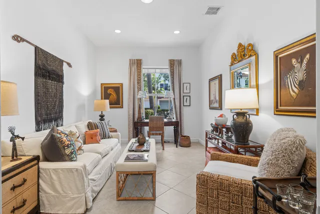 a view of a chair and table in the backyard
