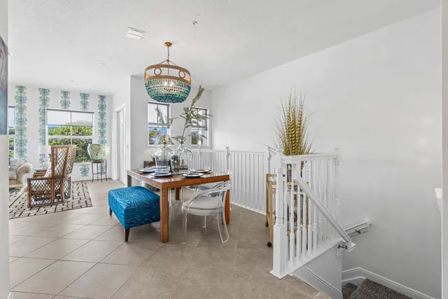 a bedroom with a bed and a table