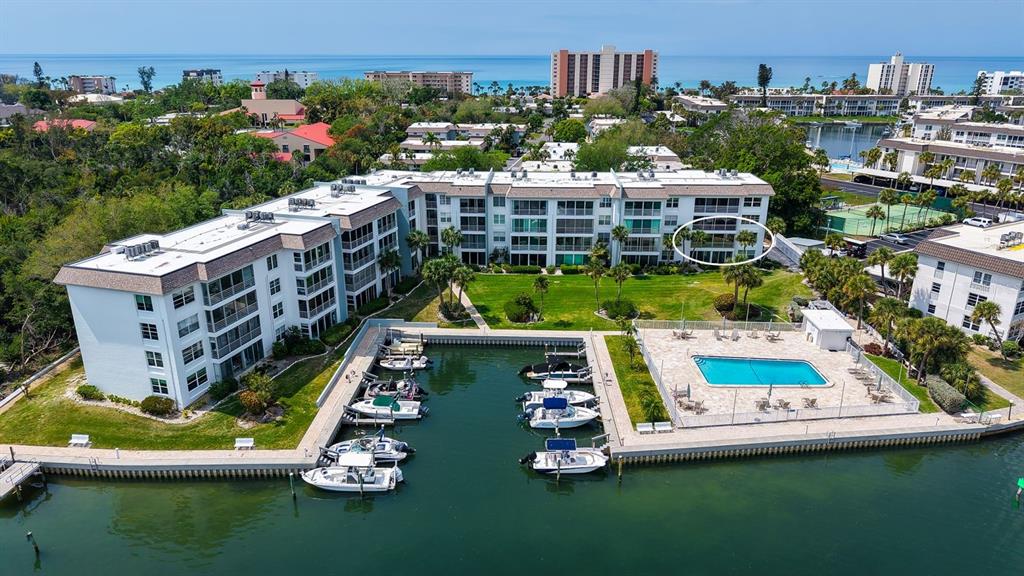 605 Sutton Place, Unit 201 Longboat Key, FL 34228 - Photo 1 of 46