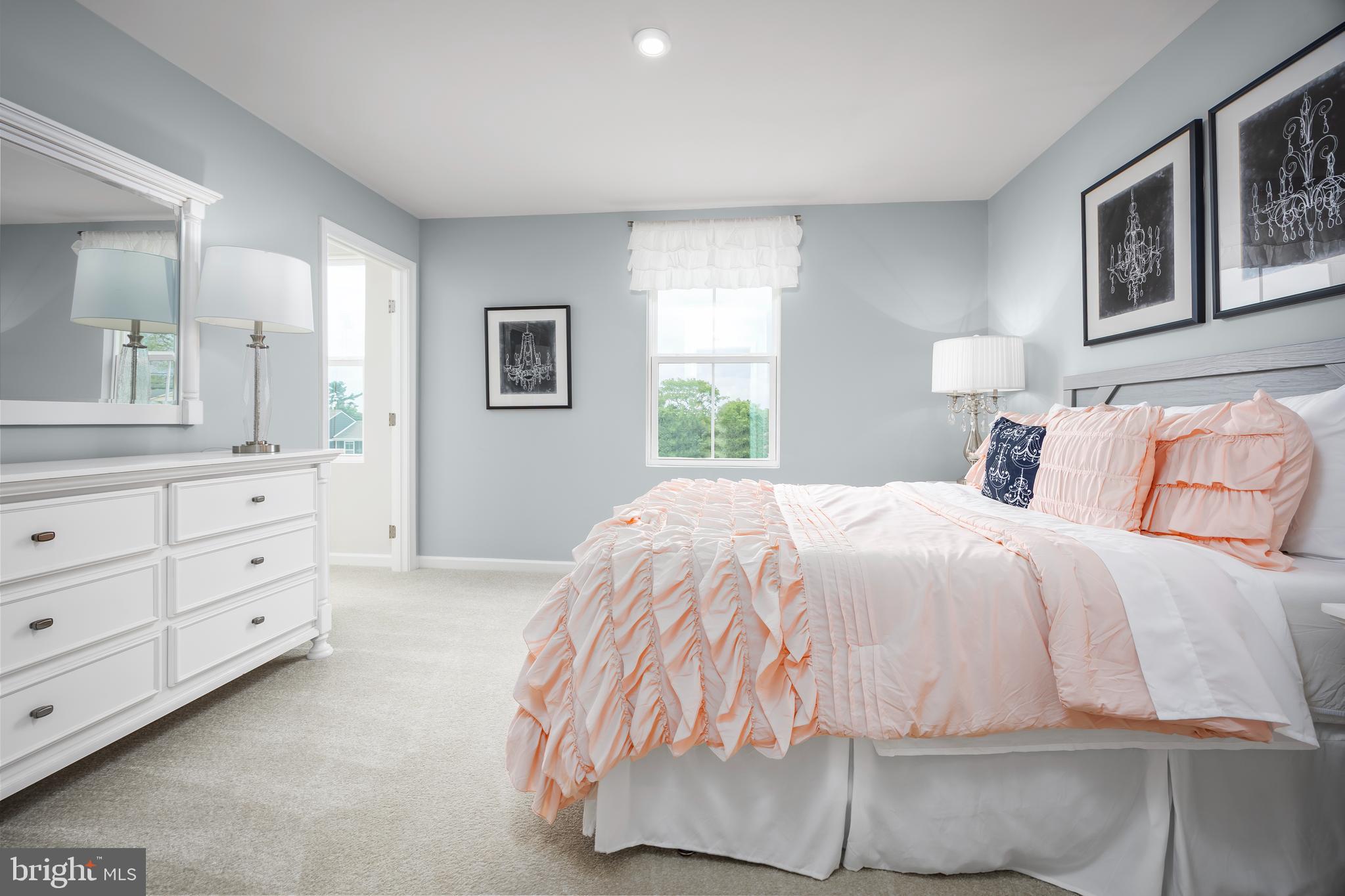 2204 Mutual Drive Inwood, WV 25428 - Photo 16 of 20 a bedroom with a bed and a window