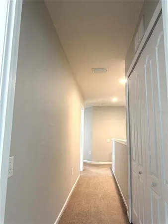 a view of a hallway to a room
