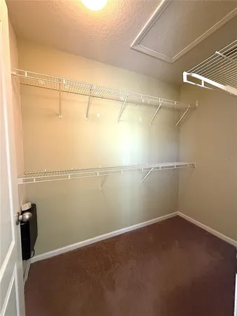 a view of a room with racks on the wall