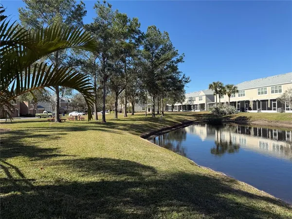 a view of swimming pool with seating space
