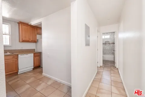 a view of a kitchen with a sink