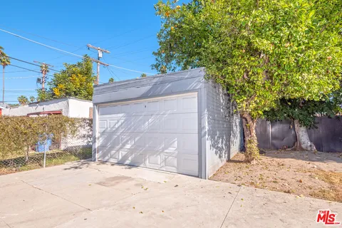 a view of a backyard of the house