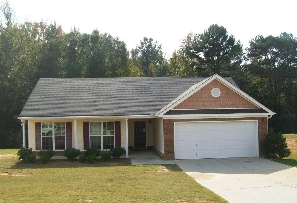 351 Simeon Road, Unit 43 Statham, GA 30666 - Photo 1 of 1 a front view of a house with a yard