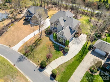 a view of swimming pool with seating area
