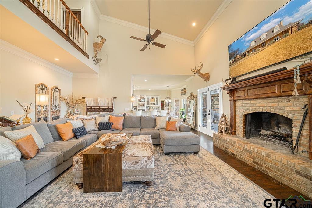 19980 FM 449 Longview, TX 75605 - Photo 11 of 48 a living room with furniture fireplace and a rug