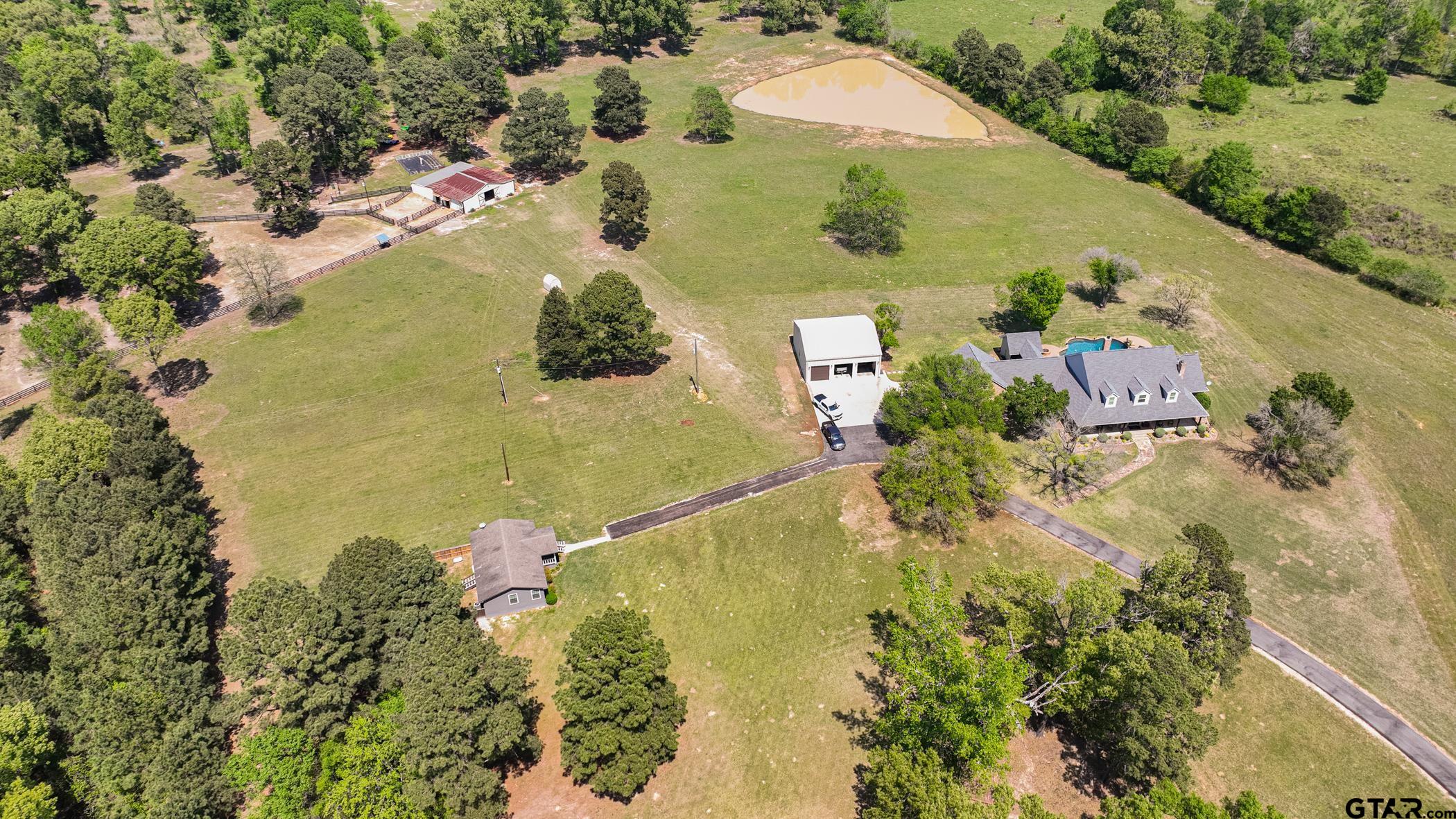 19980 FM 449 Longview, TX 75605 - Photo 46 of 48 an aerial view of residential houses with outdoor space