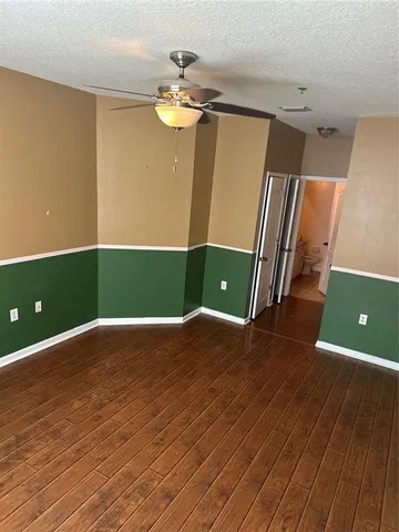 a view of room window and wooden floor