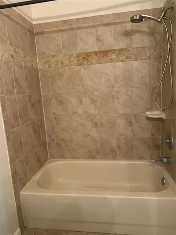 a bathroom with a sink a toilet and a bathtub