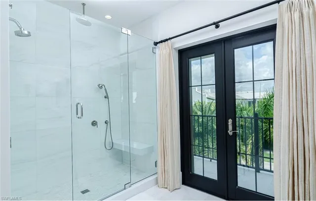 a bathroom with a sink vanity and a mirror