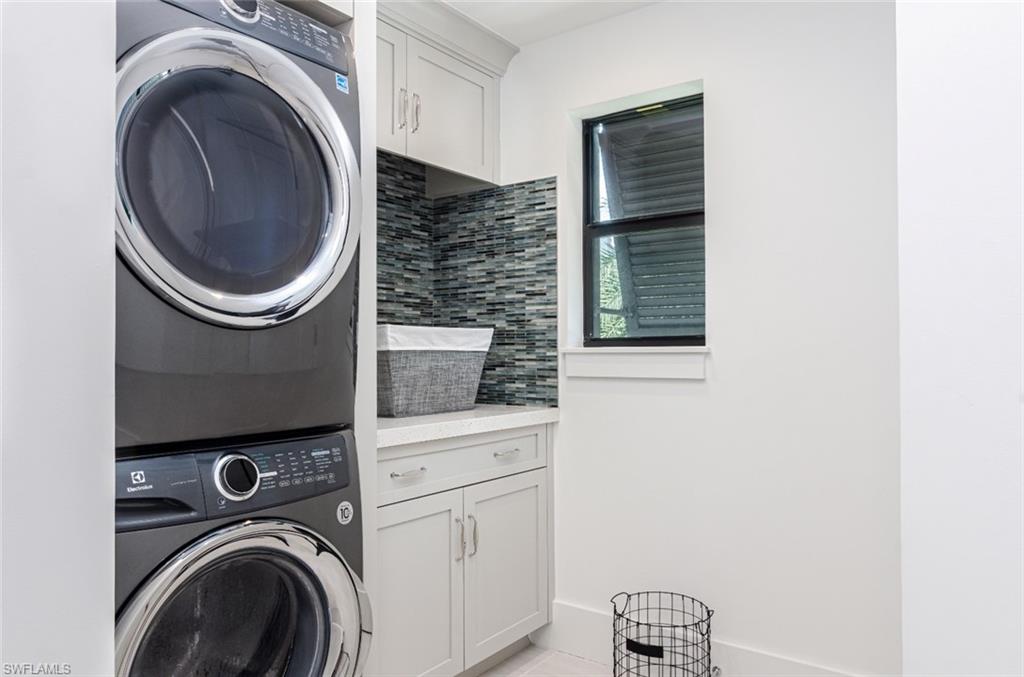 930 9th Street South, Unit 930 Naples, FL 34102 - Photo 16 of 17 a close up view of a washer and dryer