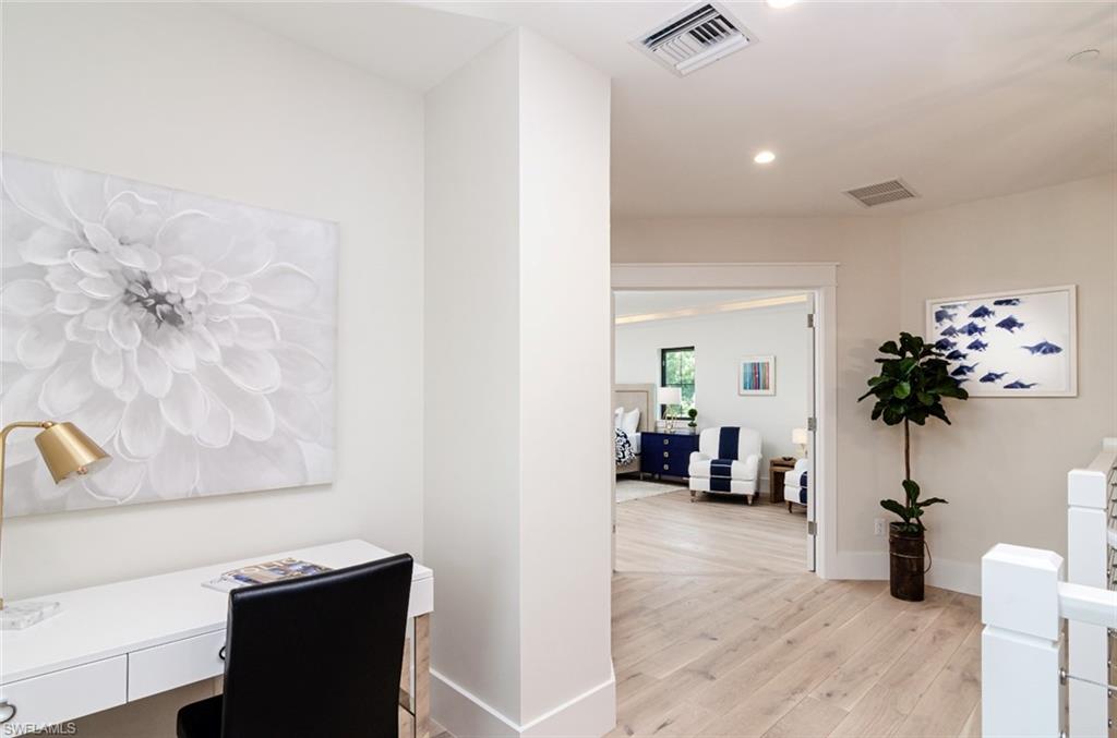 930 9th Street South, Unit 930 Naples, FL 34102 - Photo 9 of 17 a living room with furniture