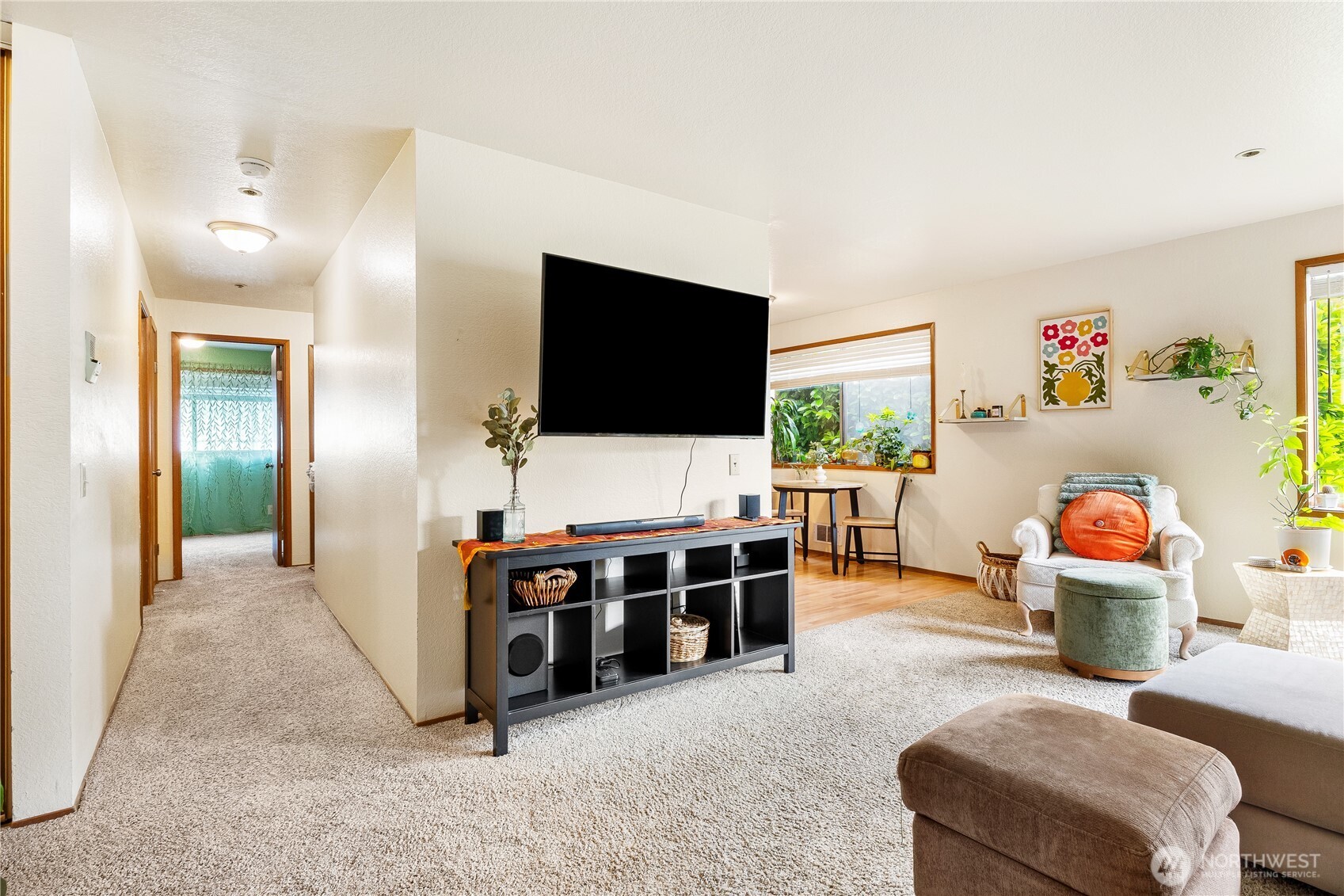 2619 Rucker Avenue, Unit 2 Everett, WA 98201 - Photo 8 of 33 a living room with furniture and a flat screen tv