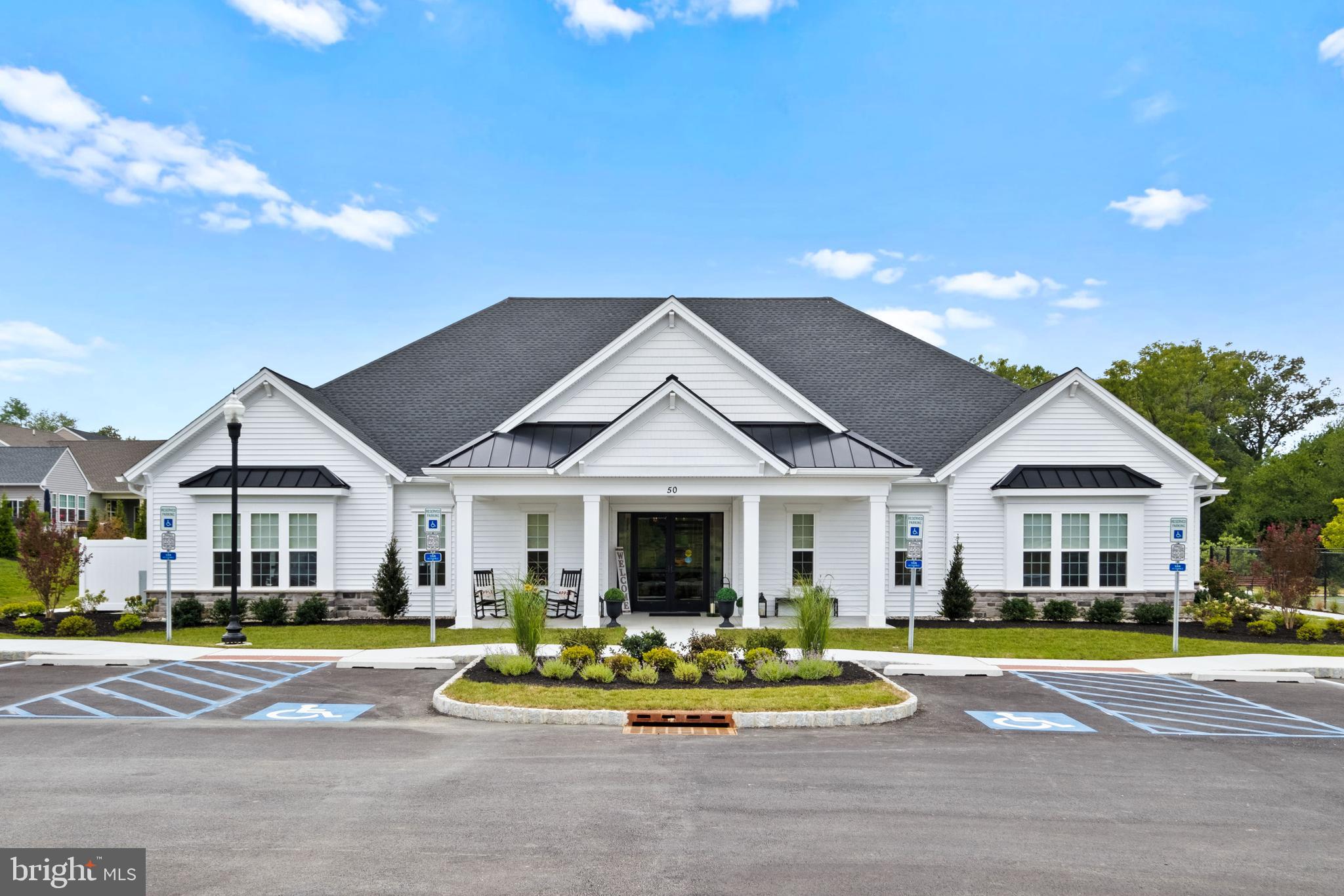 0 Messina Loop Loop Mullica Hill, NJ 08062 - Photo 13 of 35 a view of a house with a big yard and large trees