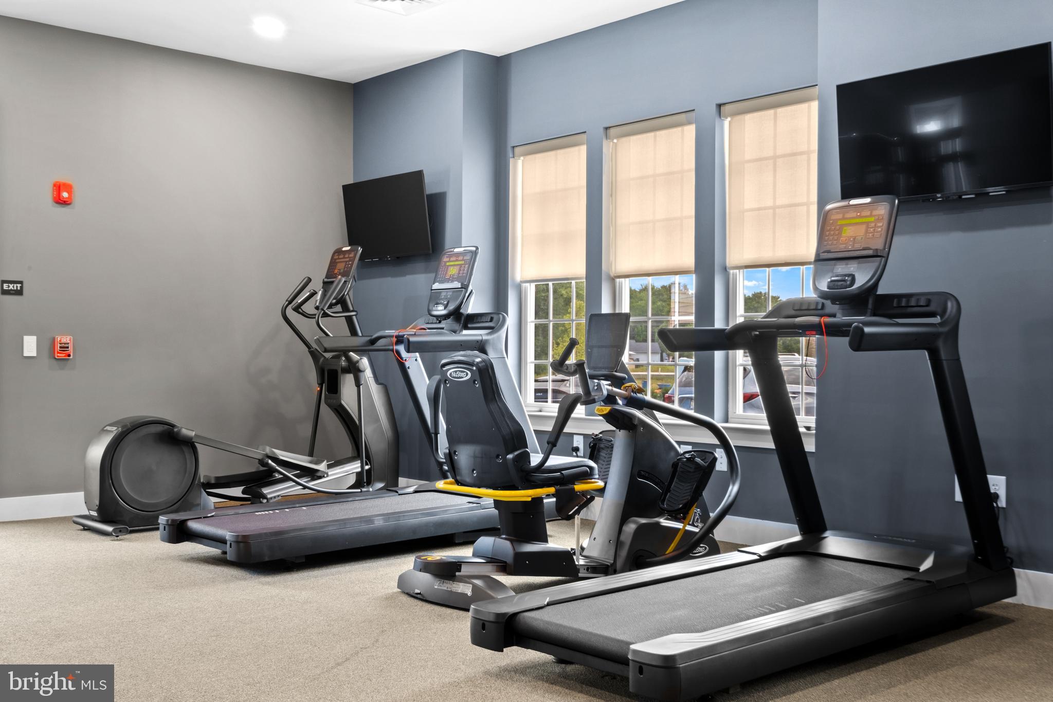 0 Messina Loop Loop Mullica Hill, NJ 08062 - Photo 30 of 35 a view of a room with gym equipment