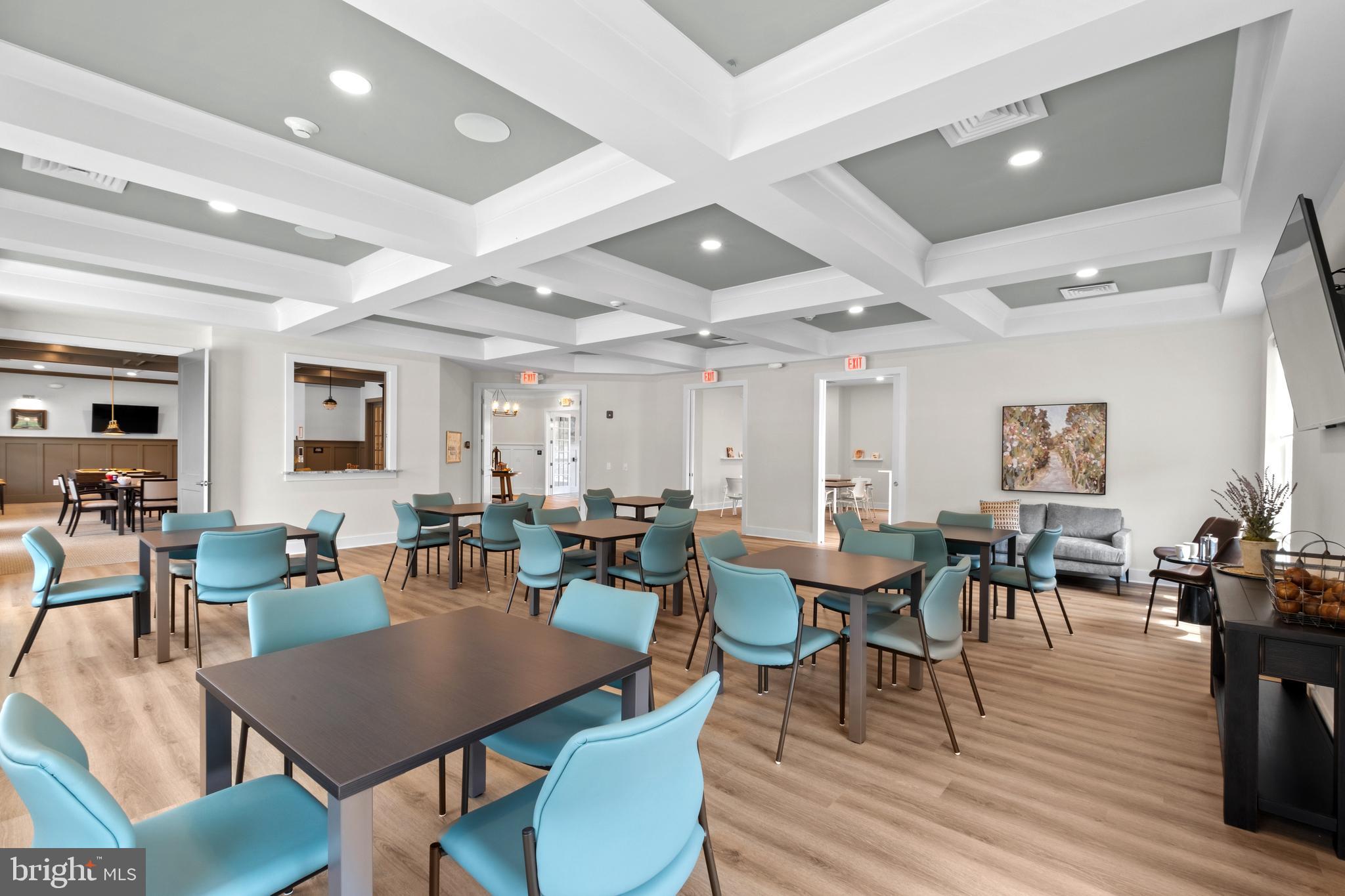 0 Messina Loop Loop Mullica Hill, NJ 08062 - Photo 35 of 35 a view of a dining room with furniture wooden floor and chandelier