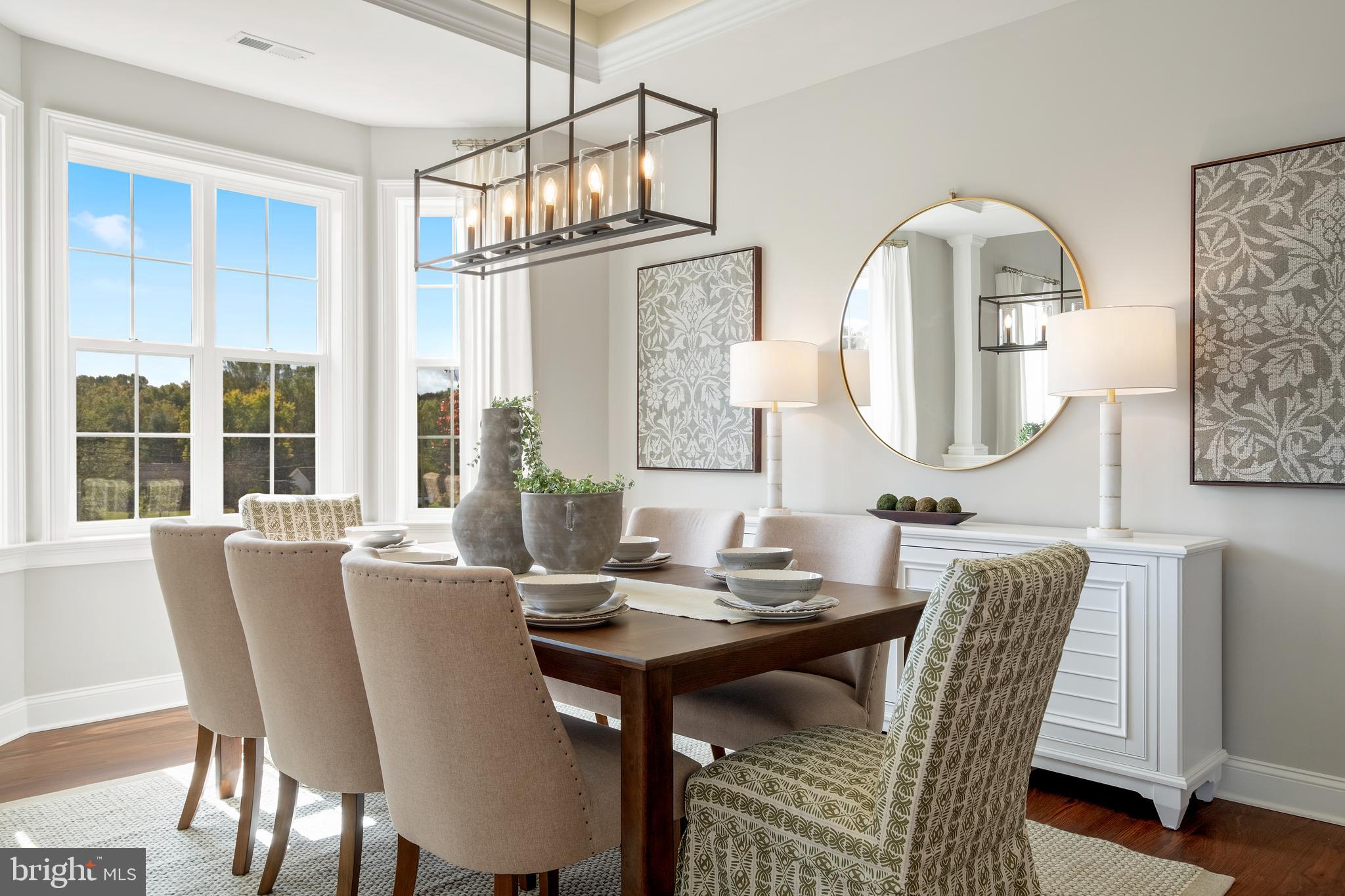 0 Messina Loop Loop Mullica Hill, NJ 08062 - Photo 5 of 35 a view of a dining room with furniture