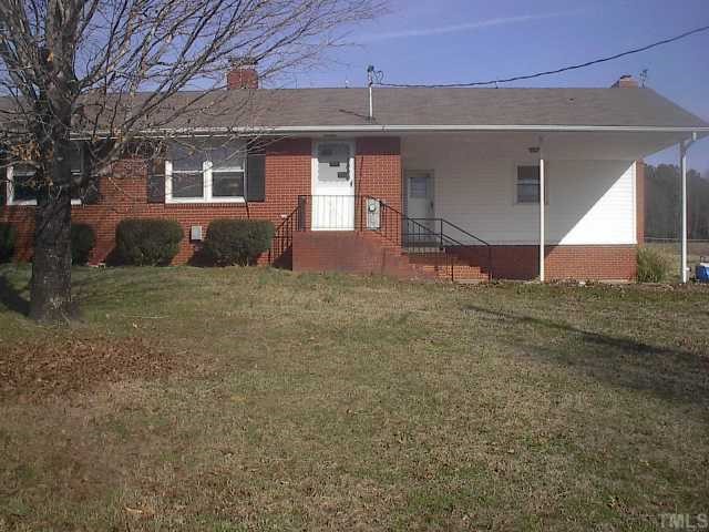 3949 Highway 42 Raleigh, NC 27603 - Photo 1 of 12 a view of a house with a yard