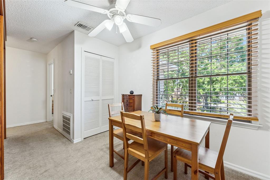 1017 Monroe Avenue St. Cloud, FL 34769 - Photo 18 of 53 a view of a dining room with furniture window and outside view