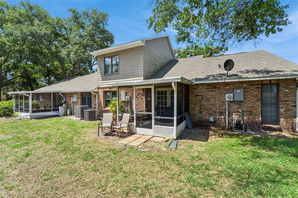 1017 Monroe Avenue St. Cloud, FL 34769 - Photo 30 of 53 front view of a house with a yard