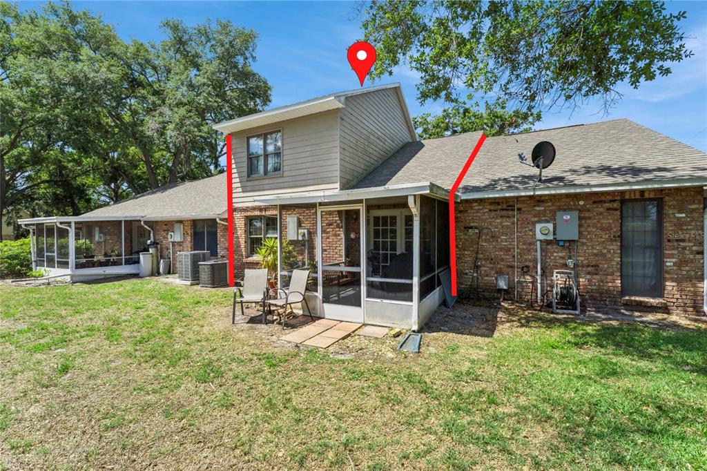 1017 Monroe Avenue St. Cloud, FL 34769 - Photo 31 of 53 a view of a house with sitting area and garden