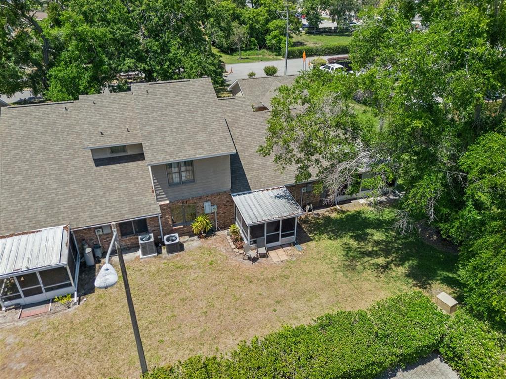 1017 Monroe Avenue St. Cloud, FL 34769 - Photo 36 of 53 an aerial view of a backyard with chairs