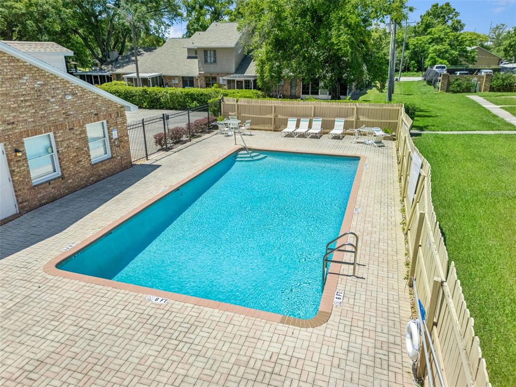 1017 Monroe Avenue St. Cloud, FL 34769 - Photo 45 of 53 a view of a swimming pool with a patio