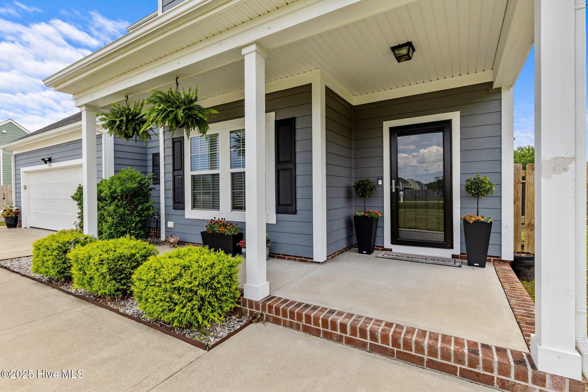 119 Elrod Road Moyock, NC 27958 - Photo 3 of 27 Enjoy the covered porch