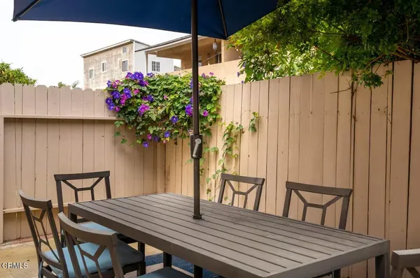 a view of a table and chairs in patio