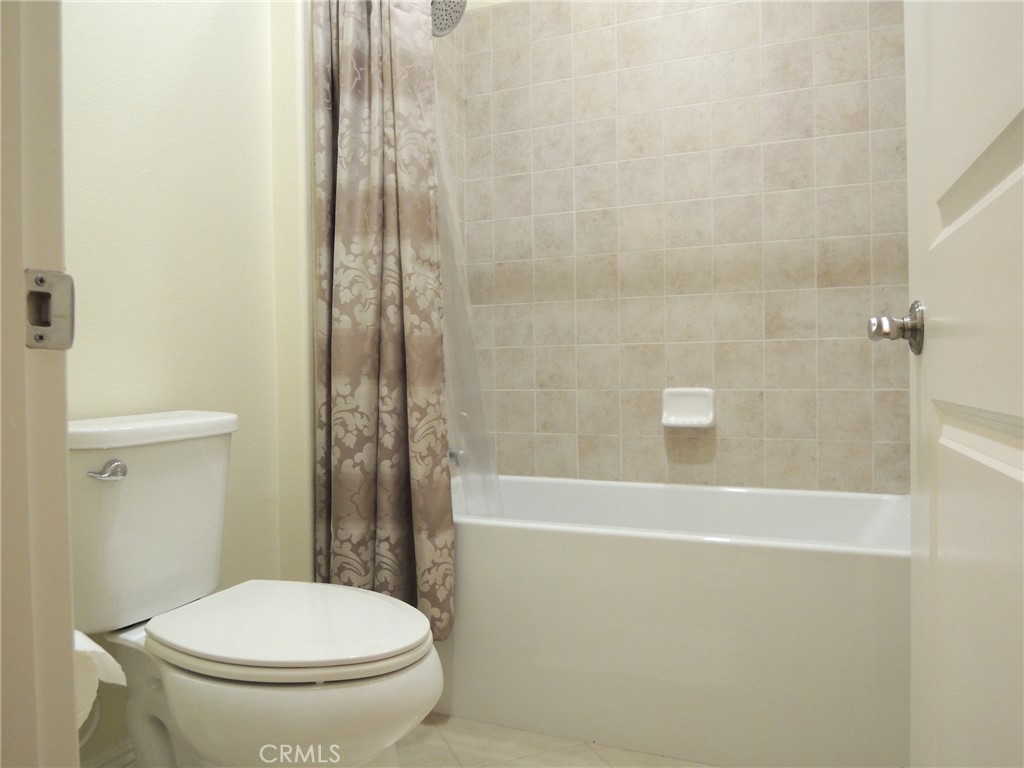 122 Bumblebee Irvine, CA 92618 - Photo 11 of 21 a bathroom with a toilet and a shower