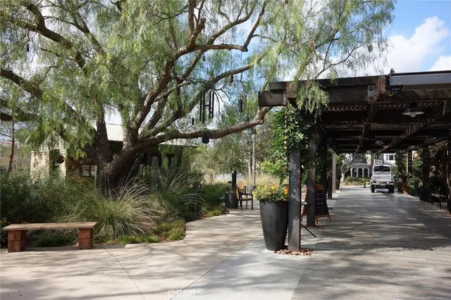 a view of street along with trees