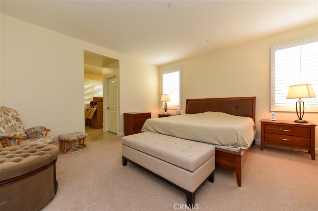 122 Bumblebee Irvine, CA 92618 - Photo 10 of 21 a bedroom with a bed and a couch