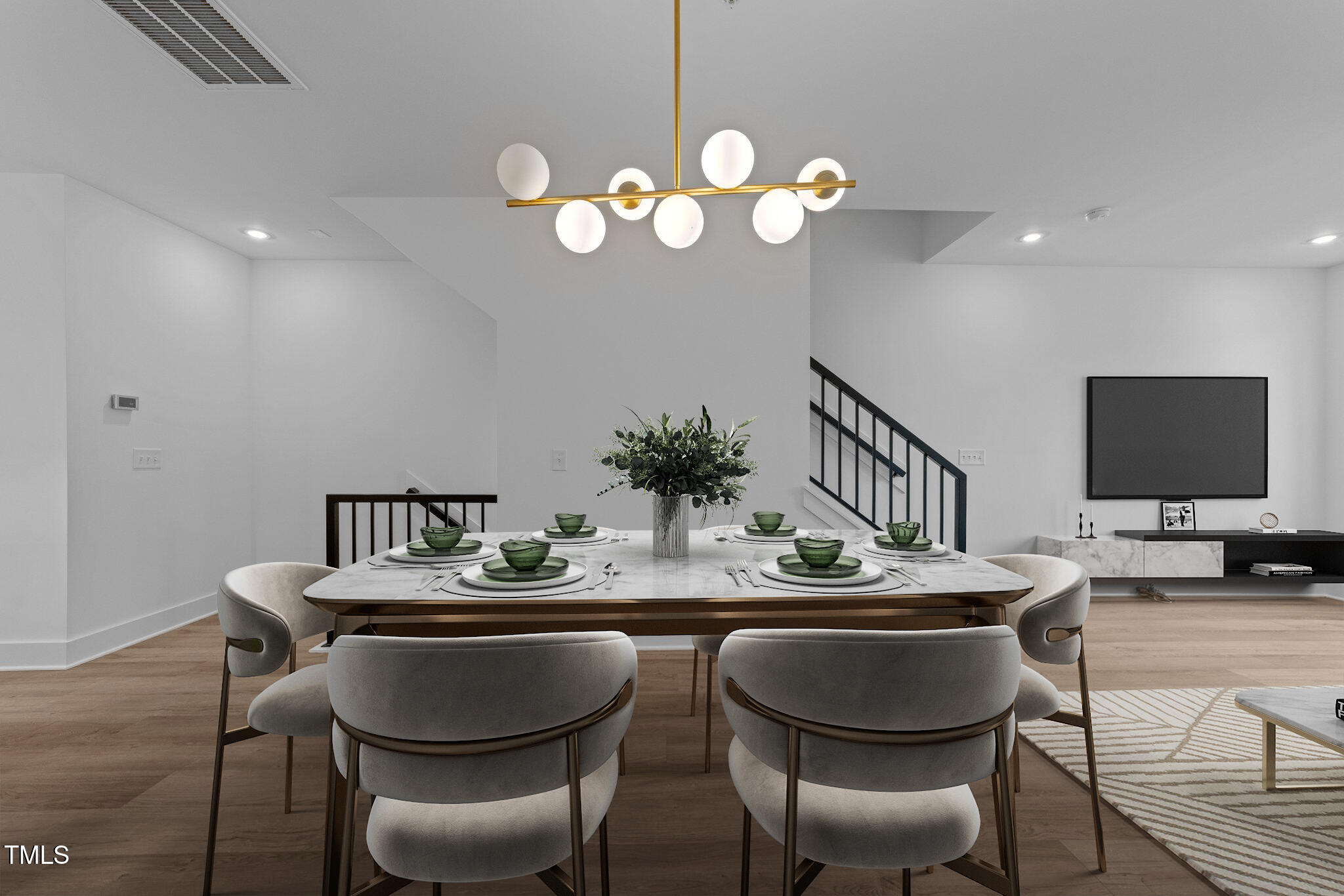 710 West North Street, Unit 102 Raleigh, NC 27603 - Photo 15 of 37 a dining room with wooden floor and breakfast area