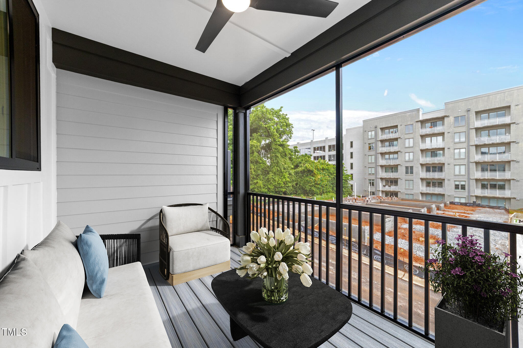 710 West North Street, Unit 102 Raleigh, NC 27603 - Photo 22 of 44 a view of two chairs in the balcony