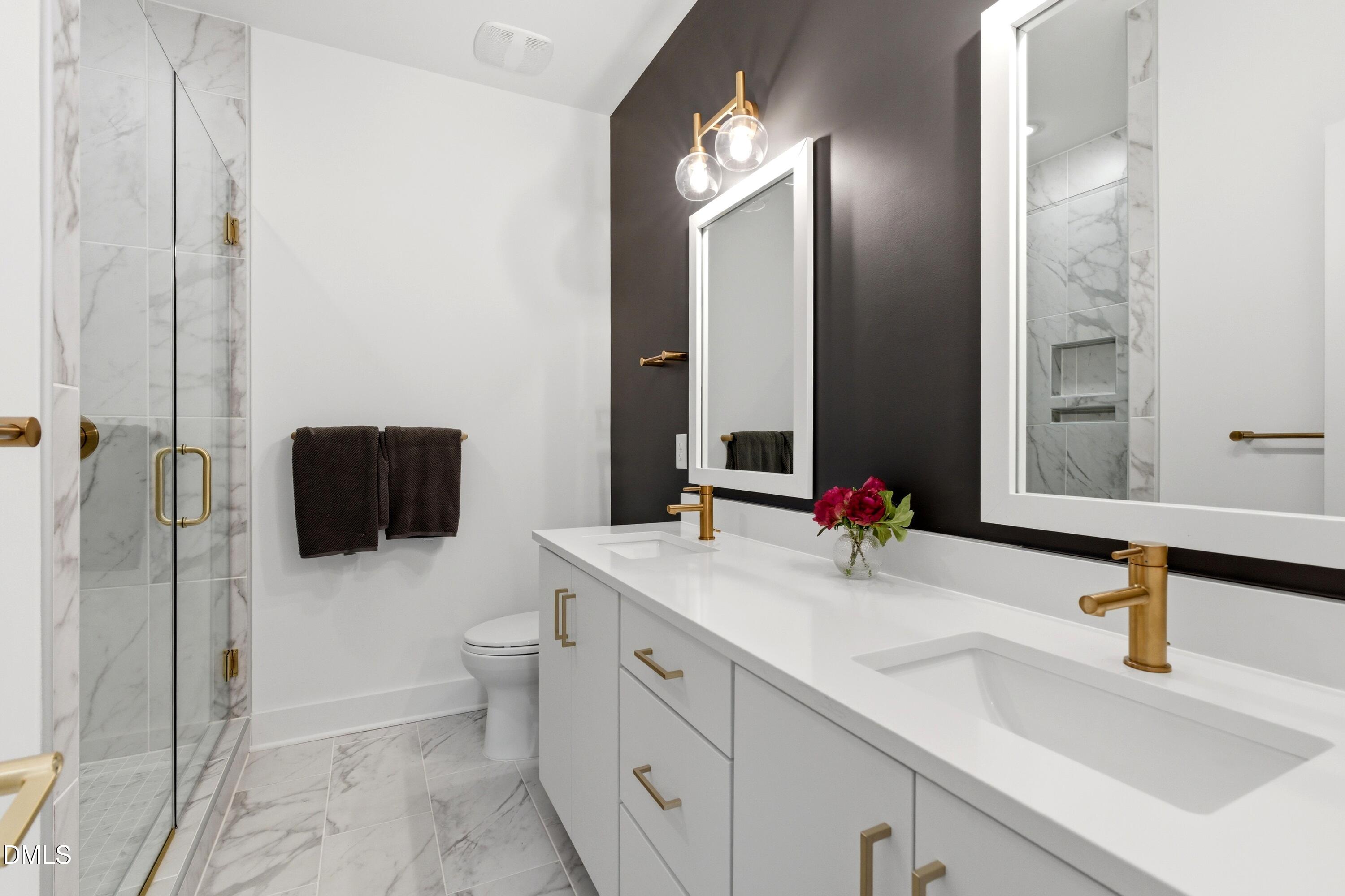 710 West North Street, Unit 102 Raleigh, NC 27603 - Photo 27 of 44 Primary Bathroom Suite