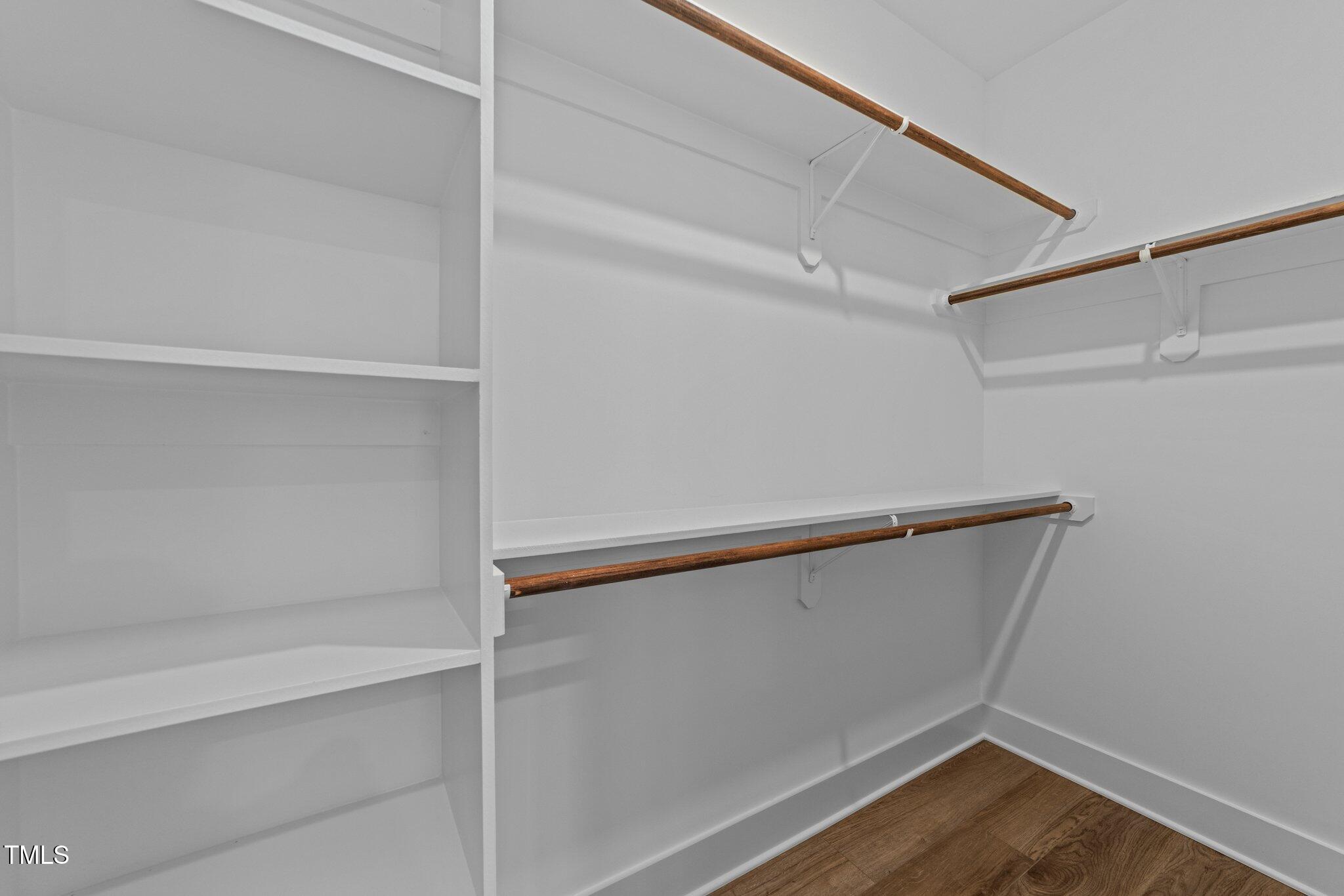 710 West North Street, Unit 102 Raleigh, NC 27603 - Photo 30 of 44 a view of an empty walk in closet