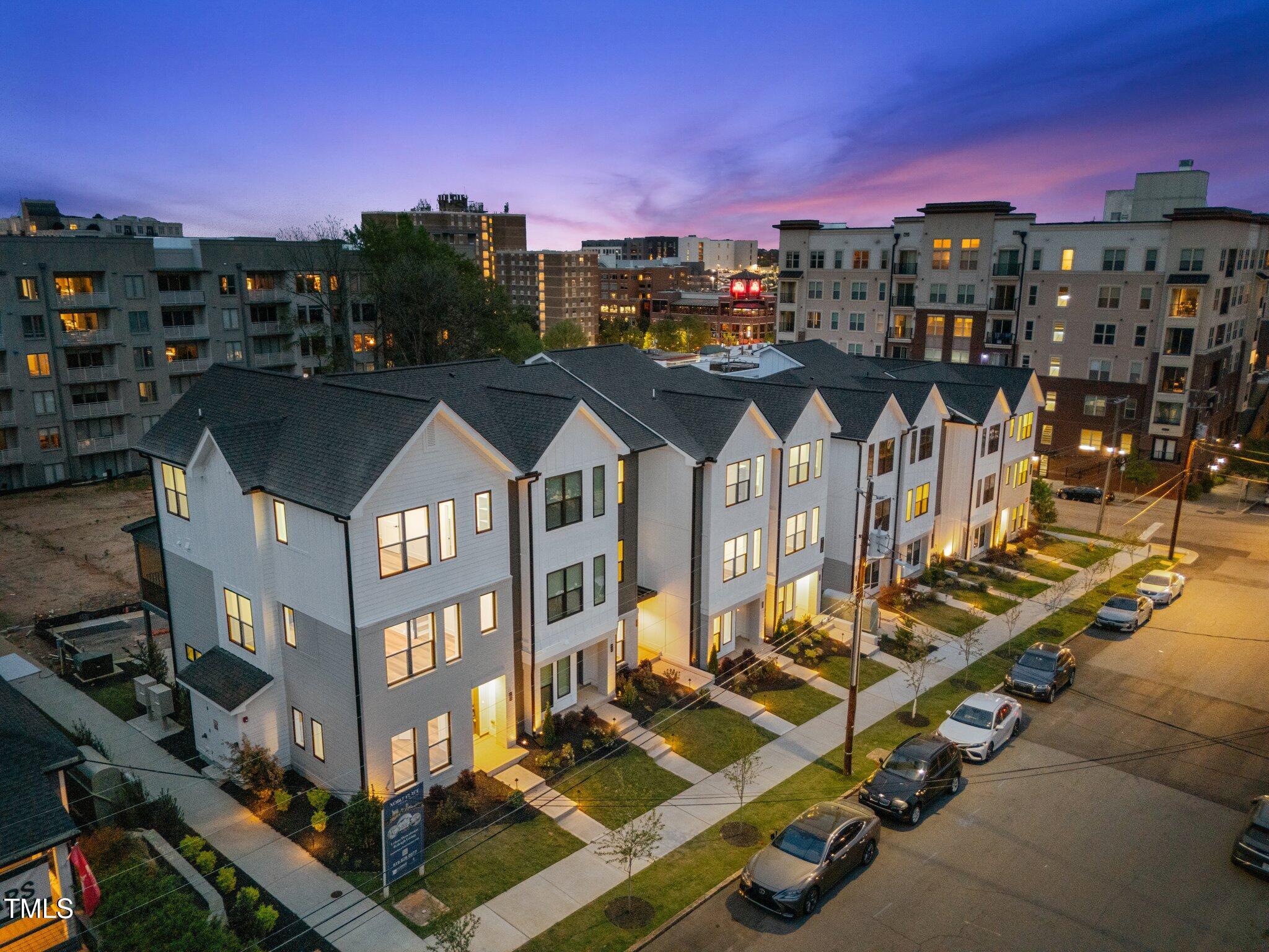710 West North Street, Unit 102 Raleigh, NC 27603 - Photo 36 of 37 a view of a city with tall buildings